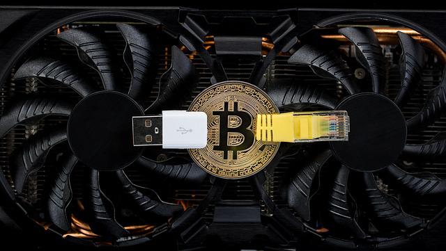 Bitcoin Mining Bild von WorldSpectrum auf Pixabay